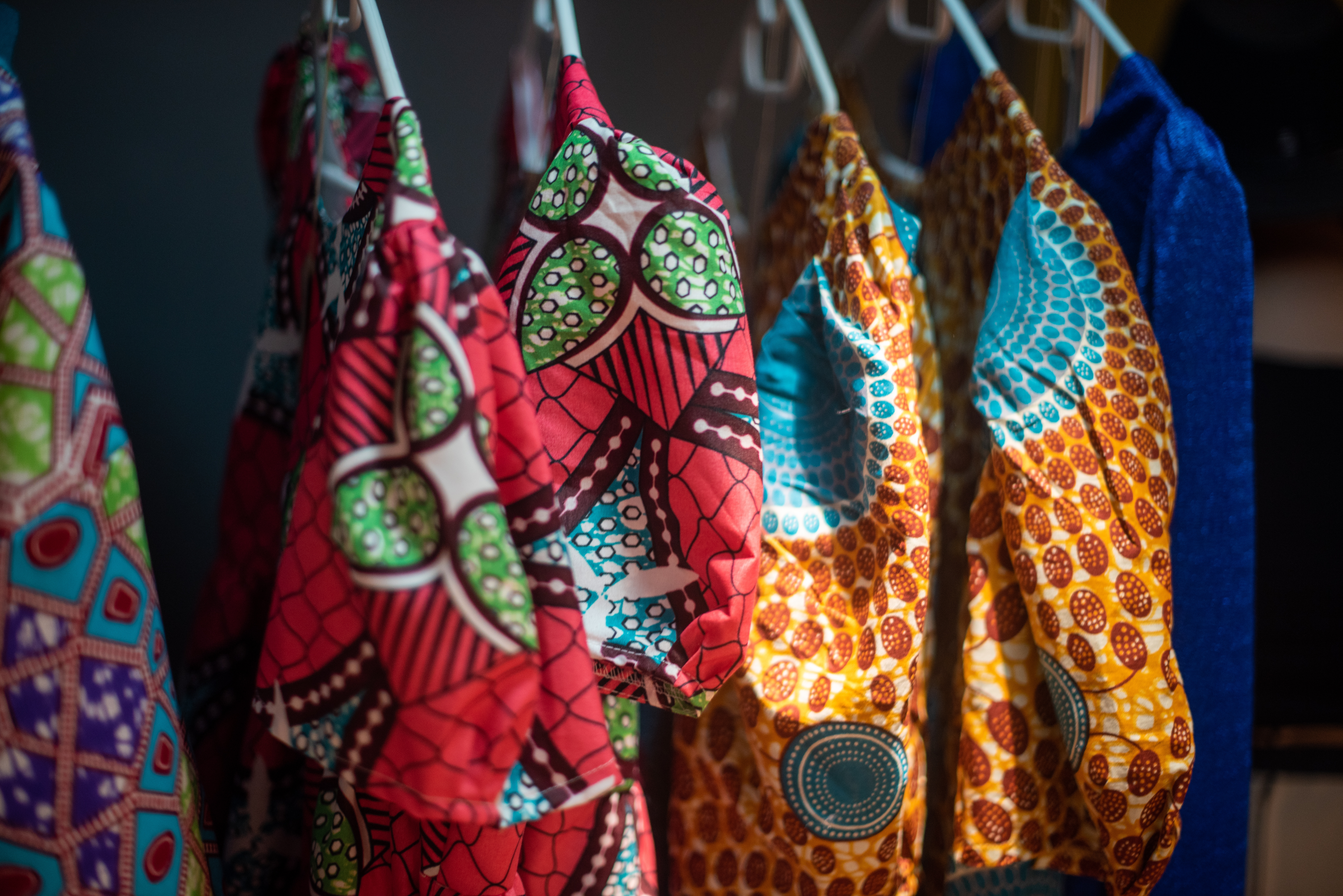Colorful African dresses at market